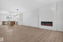 132 Pierwyck Loop, Spruce Grove, AB  - Indoor Photo Showing Living Room With Fireplace 