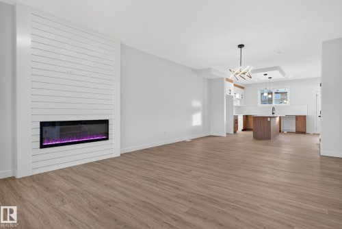 134 Pierwyck Loop, Spruce Grove, AB - Indoor Photo Showing Living Room With Fireplace