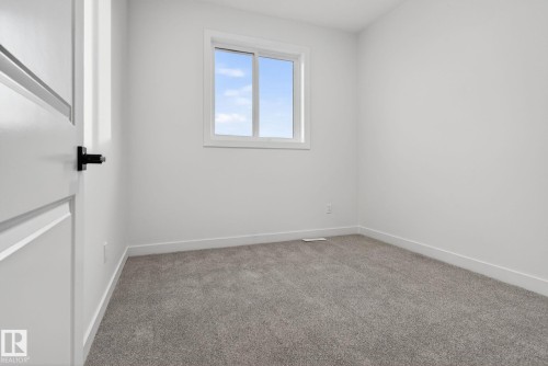 134 Pierwyck Loop, Spruce Grove, AB - Indoor Photo Showing Other Room