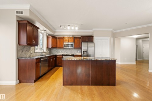 218 12408 15 Avenue, Edmonton, AB - Indoor Photo Showing Kitchen With Double Sink