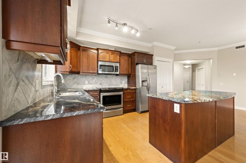 218 12408 15 Avenue, Edmonton, AB - Indoor Photo Showing Kitchen With Stainless Steel Kitchen With Double Sink