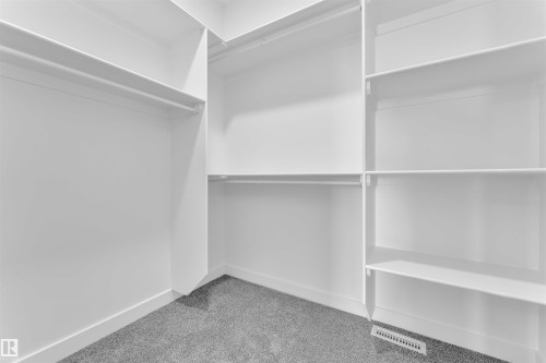 404 Pine Point(E), Leduc, AB - Indoor With Storage