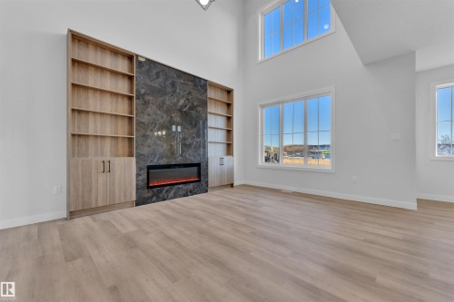 236 Crystal Creek Drive, Leduc, AB - Indoor Photo Showing Other Room With Fireplace