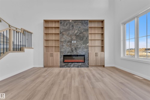 236 Crystal Creek Drive, Leduc, AB - Indoor Photo Showing Living Room With Fireplace