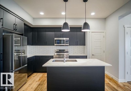 75 Greenfield Link, Fort Saskatchewan, AB - Indoor Photo Showing Kitchen With Stainless Steel Kitchen With Upgraded Kitchen