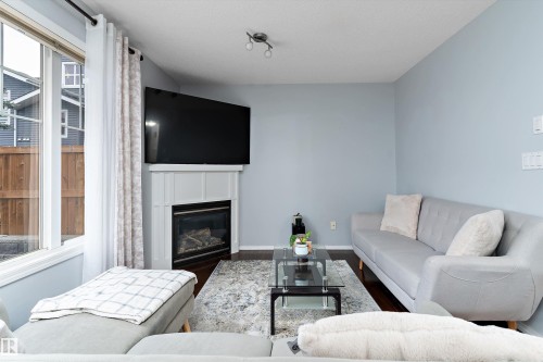 22 16003 132 St, Edmonton, AB - Indoor Photo Showing Living Room With Fireplace