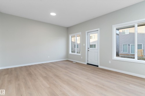 Entryway with light wood-style floors and recessed lighting - 6320 King Wynd, Edmonton, AB - Indoor Photo Showing Other Room