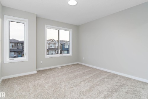 Unfurnished room with light carpet and recessed lighting - 6320 King Wynd, Edmonton, AB - Indoor Photo Showing Other Room