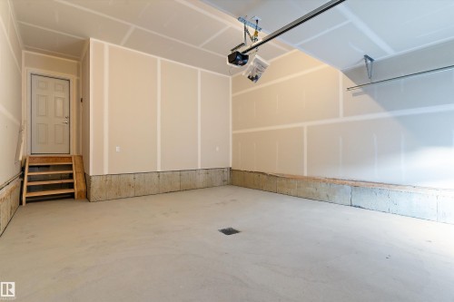 Garage featuring a garage door opener - 6320 King Wynd, Edmonton, AB - Indoor