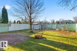 Fenced backyard with a patio - 