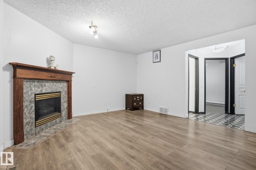 5304 190 Street, Edmonton, AB - Indoor Photo Showing Living Room With Fireplace