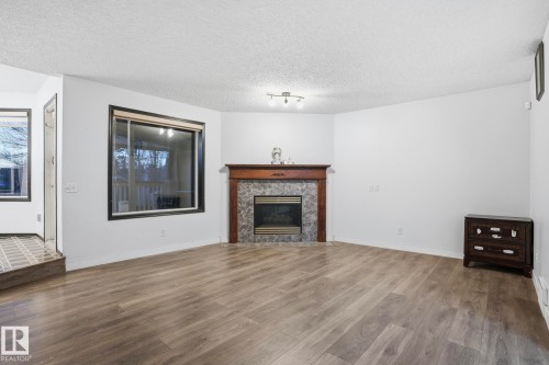 5304 190 Street, Edmonton, AB - Indoor Photo Showing Living Room With Fireplace