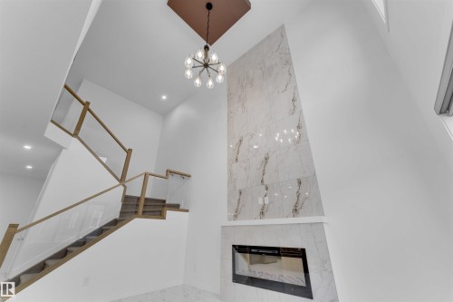 3512 41 Avenue, Beaumont, AB - Indoor Photo Showing Other Room With Fireplace