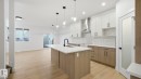 110 Spring Link, Spruce Grove, AB  - Indoor Photo Showing Kitchen With Upgraded Kitchen 