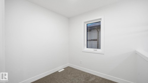 110 Spring Link, Spruce Grove, AB - Indoor Photo Showing Other Room