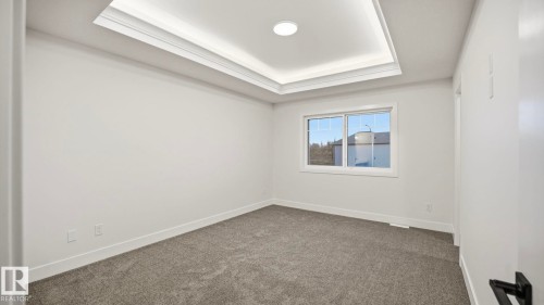 110 Spring Link, Spruce Grove, AB - Indoor Photo Showing Other Room