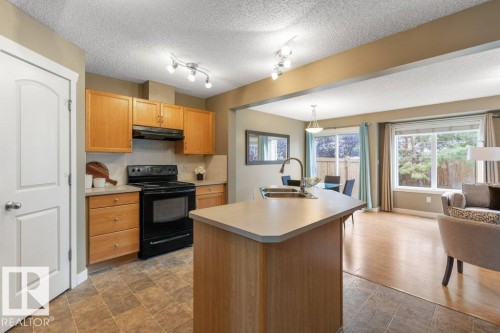 70 14208 36 Street, Edmonton, AB - Indoor Photo Showing Kitchen With Double Sink