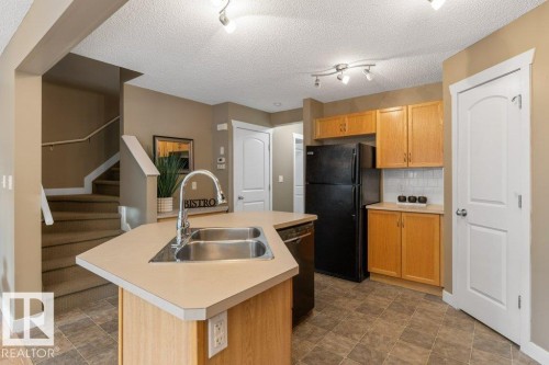 70 14208 36 Street, Edmonton, AB - Indoor Photo Showing Kitchen With Double Sink