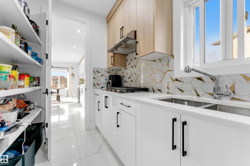 3822 42 Avenue, Beaumont, AB - Indoor Photo Showing Kitchen With Double Sink