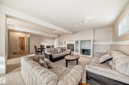 22 Lakewood Cove N, Spruce Grove, AB - Indoor Photo Showing Living Room With Fireplace