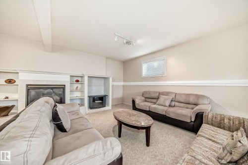 22 Lakewood Cove N, Spruce Grove, AB - Indoor Photo Showing Living Room With Fireplace
