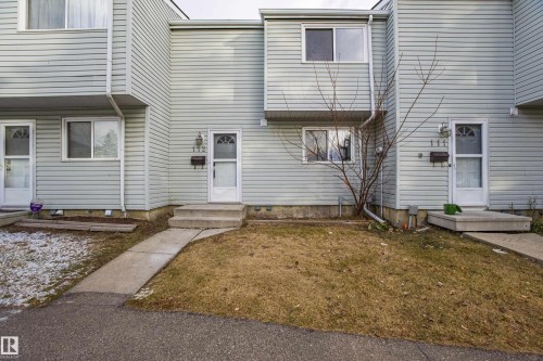 View of front of house with a front lawn - 112 Dickinsfield Court Nw, Edmonton, AB - Outdoor