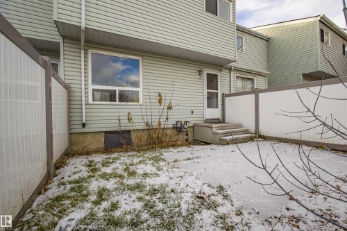 Snow covered house with crawl space - 112 Dickinsfield Court Nw, Edmonton, AB - Outdoor With Exterior