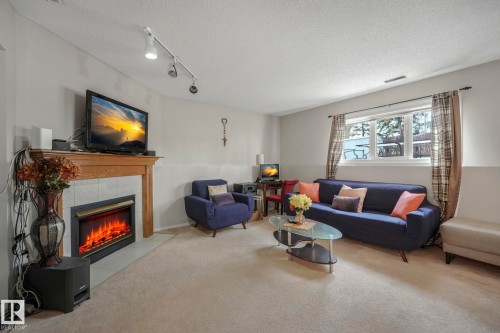 9540 177 Avenue, Edmonton, AB - Indoor Photo Showing Living Room With Fireplace