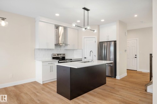 374 Bluff Cove, Leduc, AB - Indoor Photo Showing Kitchen With Upgraded Kitchen