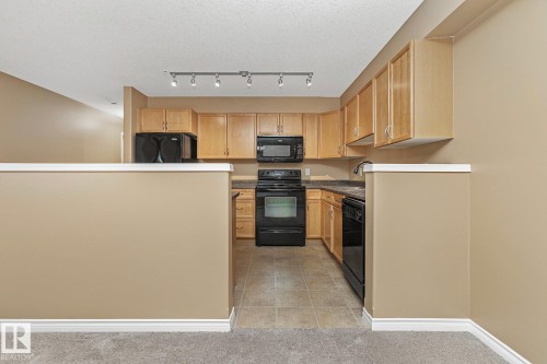 110 1589 Glastonbury Boulevard, Edmonton, AB - Indoor Photo Showing Kitchen
