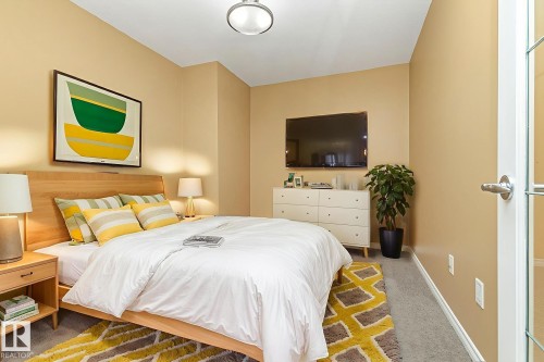 110 1589 Glastonbury Boulevard, Edmonton, AB - Indoor Photo Showing Bedroom