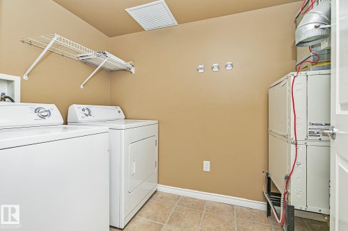110 1589 Glastonbury Boulevard, Edmonton, AB - Indoor Photo Showing Laundry Room