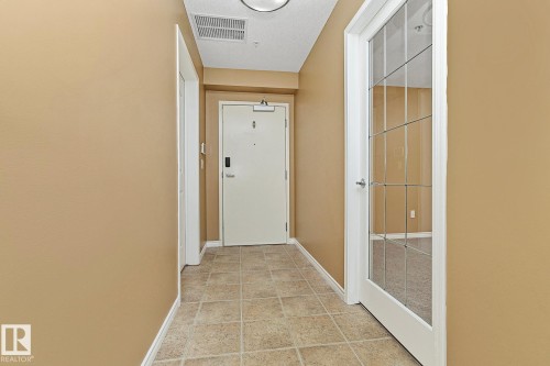 110 1589 Glastonbury Boulevard, Edmonton, AB - Indoor Photo Showing Other Room