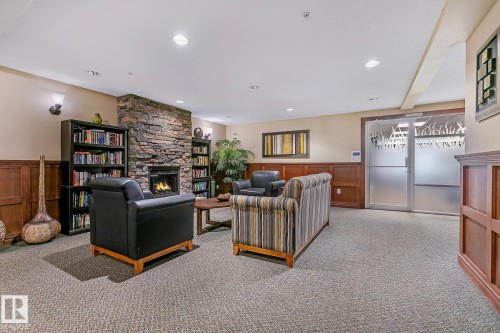 110 1589 Glastonbury Boulevard, Edmonton, AB - Indoor With Fireplace