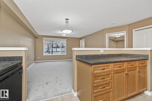 110 1589 Glastonbury Boulevard, Edmonton, AB - Indoor Photo Showing Other Room
