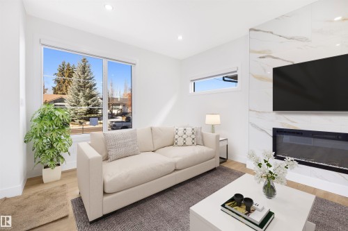 10711 52 Street, Edmonton, AB - Indoor Photo Showing Living Room With Fireplace