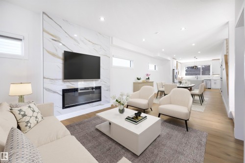 10711 52 Street, Edmonton, AB - Indoor Photo Showing Living Room With Fireplace