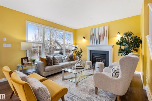 4992 Thibault Way, Edmonton, AB - Indoor Photo Showing Living Room With Fireplace