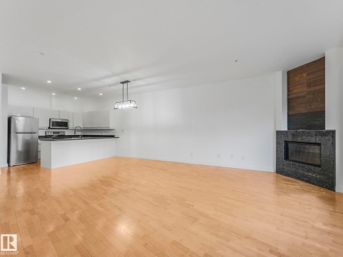 105 11415 100 Avenue, Edmonton, AB - Indoor With Fireplace