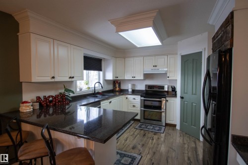 5421 53 Ave, St. Paul Town, AB - Indoor Photo Showing Kitchen With Double Sink