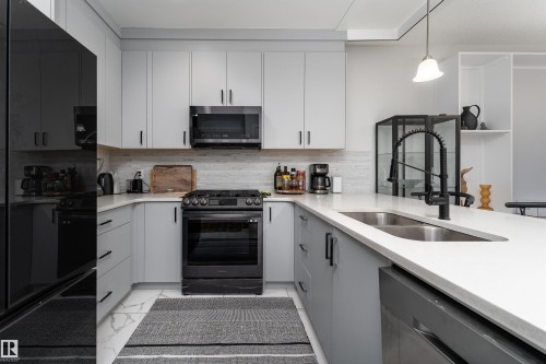 5439 Chappelle Road, Edmonton, AB - Indoor Photo Showing Kitchen With Double Sink