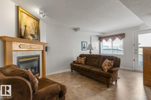 6572 158 Avenue, Edmonton, AB - Indoor Photo Showing Living Room With Fireplace