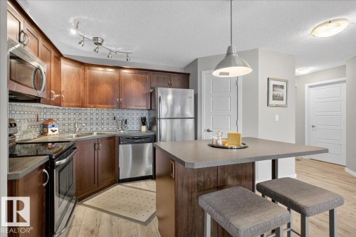 120 396 Silver Berry Road, Edmonton, AB - Indoor Photo Showing Kitchen With Stainless Steel Kitchen With Double Sink With Upgraded Kitchen