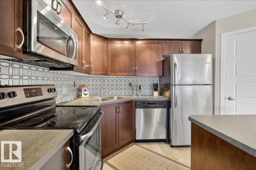 120 396 Silver Berry Road, Edmonton, AB - Indoor Photo Showing Kitchen With Stainless Steel Kitchen With Double Sink