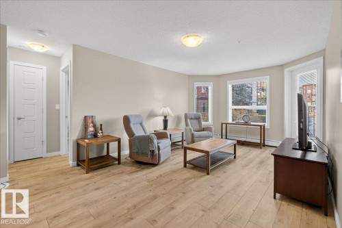 120 396 Silver Berry Road, Edmonton, AB - Indoor Photo Showing Living Room