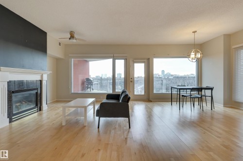 501 9708 110 Street, Edmonton, AB - Indoor Photo Showing Living Room With Fireplace