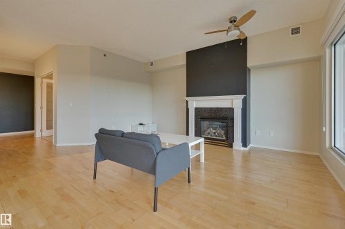 501 9708 110 Street, Edmonton, AB - Indoor Photo Showing Other Room With Fireplace