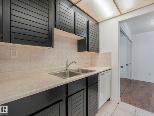 107 10421 93 Street, Edmonton, AB - Indoor Photo Showing Kitchen With Double Sink