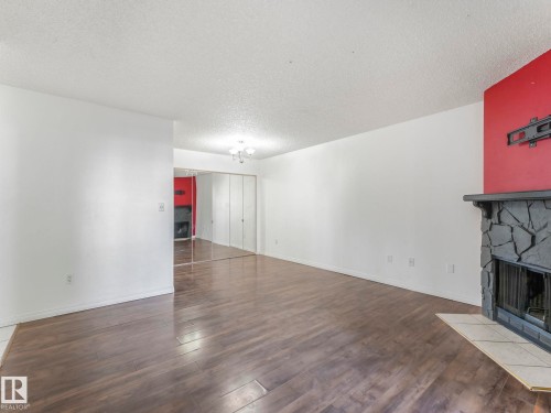 107 10421 93 Street, Edmonton, AB - Indoor With Fireplace