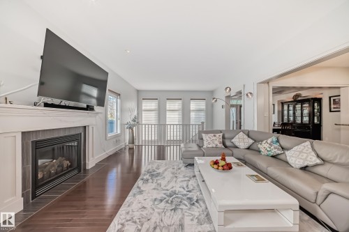 3503 Goodridge Bay Nw, Edmonton, AB - Indoor Photo Showing Living Room With Fireplace